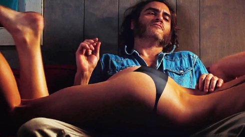 Joaquin Phoenix bogarts that butt in Inherent Vice